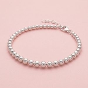 Pulsera de perlas de plata 925 contiguas en tamaño degradé con cadena de extensión