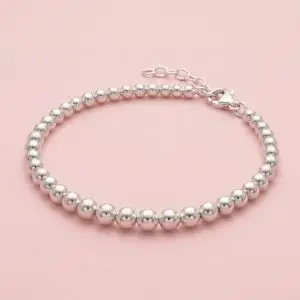 Pulsera de perlas de plata 925 contiguas en tamaño degradé con cadena de extensión