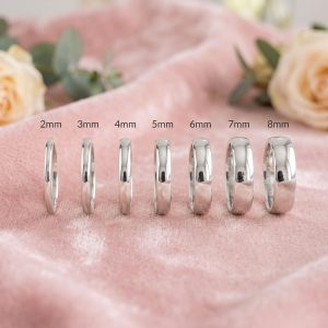 Par de alianzas de boda media caña en Plata 950 hechas a mano bajo pedido
