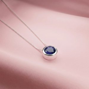 Conjunto en Plata 925 Ley con punto de luz de zafiro